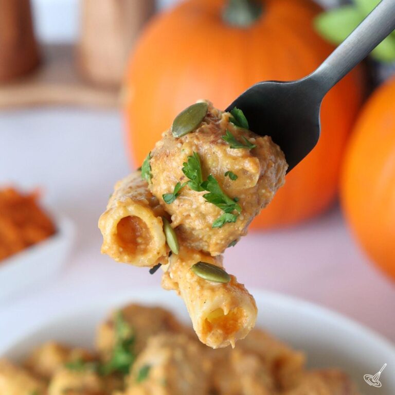 A fork holding Pumpkin Turkey Meatball pasta.