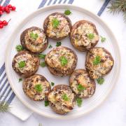 Holiday Stuffed Mushrooms on a plate.