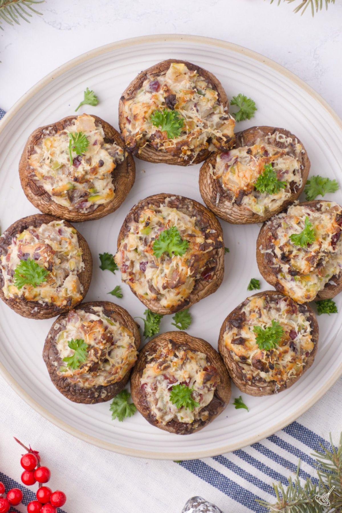 Holiday Stuffed Mushrooms on a plate.