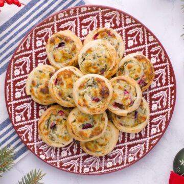 Spinach and Artichoke Pinwheels on a plate.