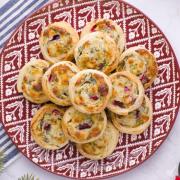 Spinach and Artichoke Pinwheels on a plate.