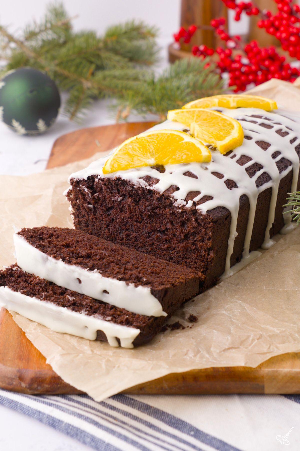 A sliced Chocolate Orange Loaf on a cutting board.