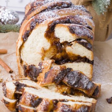 Sliced Cardamom Prune Babka on a tray.