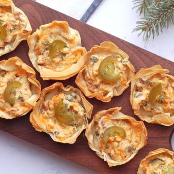 Jalapeño Poppers Phyllo Cups on a serving board.