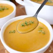 A spoonful of butternut squash and sweet potato soup