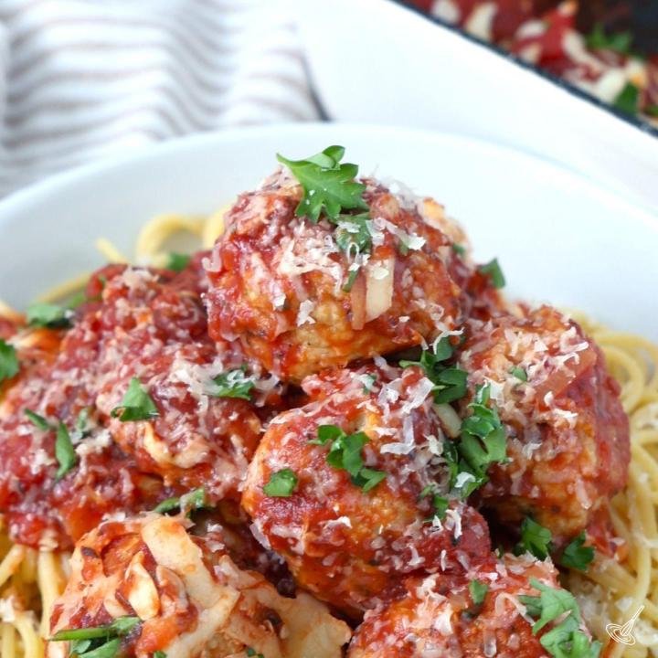 Chicken Parm Meatballs over spaghetti.