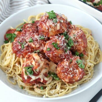 Chicken Parm Meatballs over spaghetti.