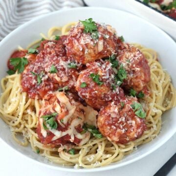 Chicken Parm Meatballs over spaghetti.