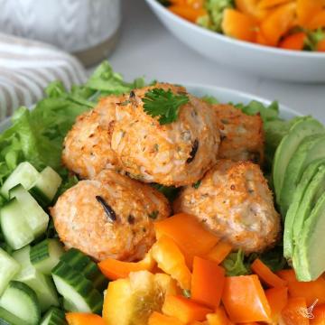 Chicken and Rice Meatballs on a salad.