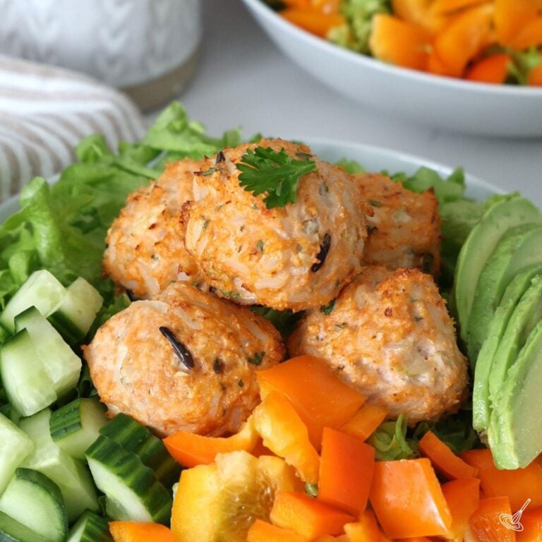 Chicken and Rice Meatballs on a salad.