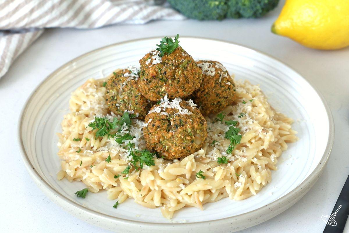Baked Broccoli Parmesan Meatballs served over lemon orzo. 