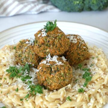Baked Broccoli Parmesan Meatballs over orzo.