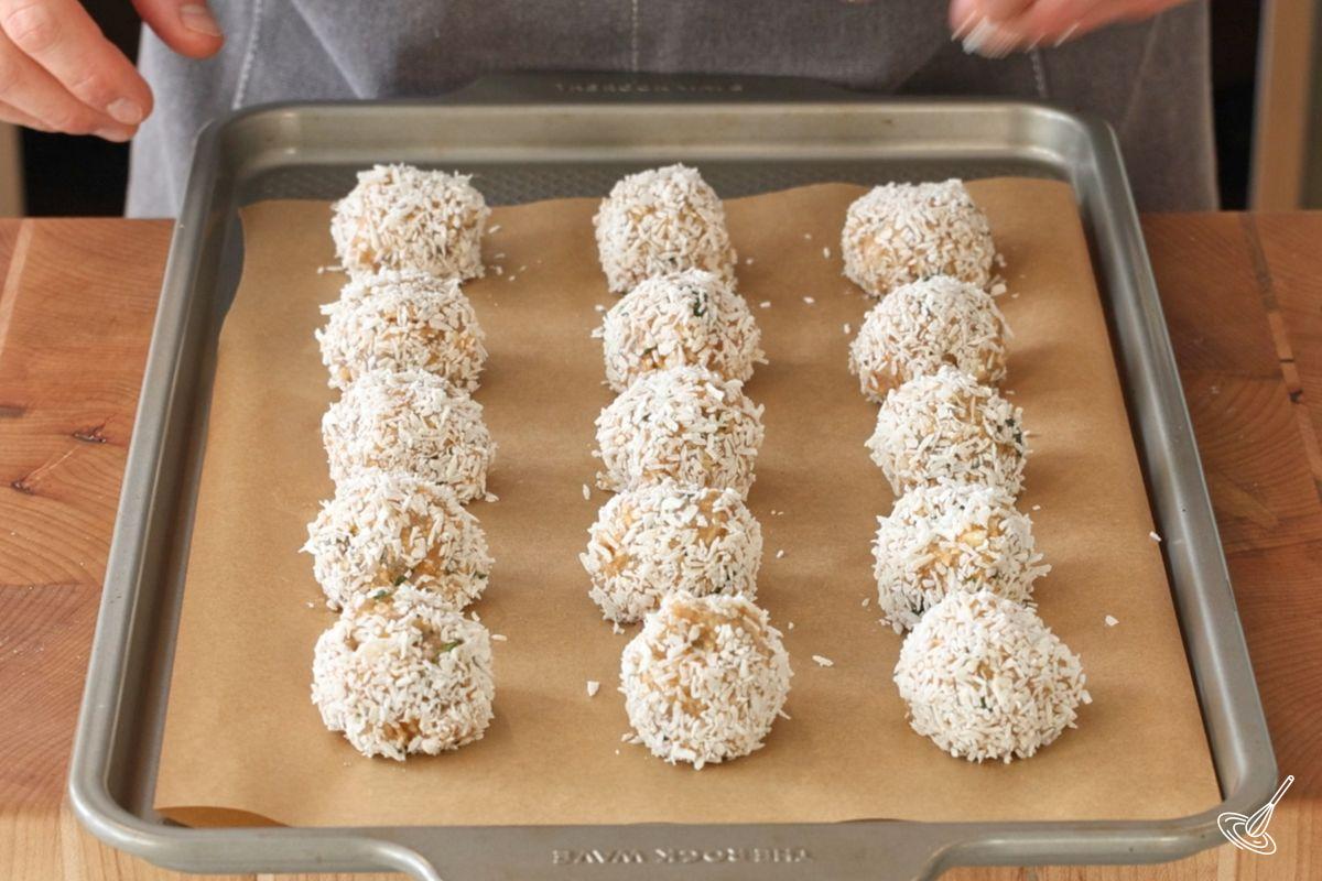 A tray of coconut shrimp meatballs ready for the oven.