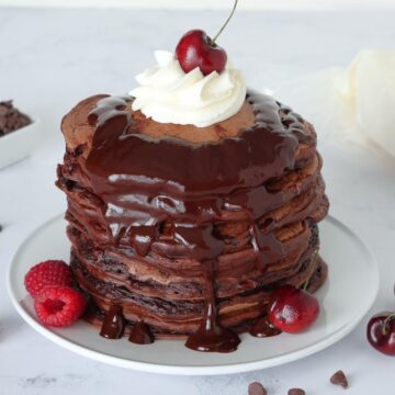 Chocolate Chocolate Chip Pancakes on a plate.
