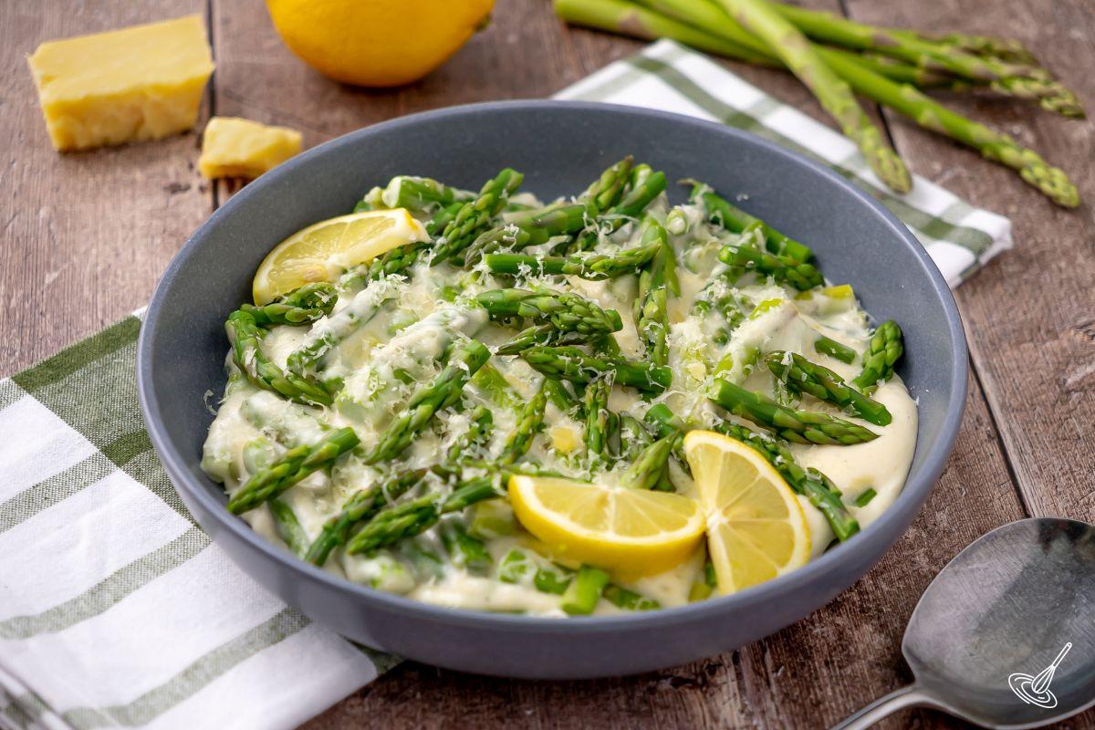 A serving bowl of Creamed Asparagus.