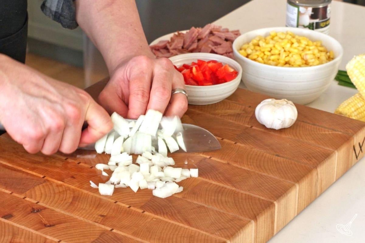 Someone dicing up an onion.