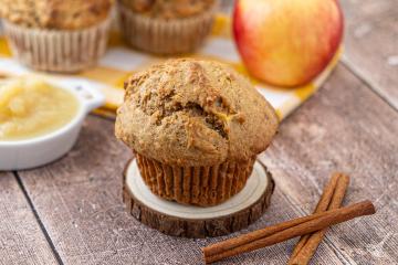 Easy Applesauce Muffins cooling down on the table.