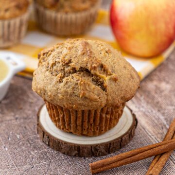 Easy Applesauce Muffins cooling down on the table.
