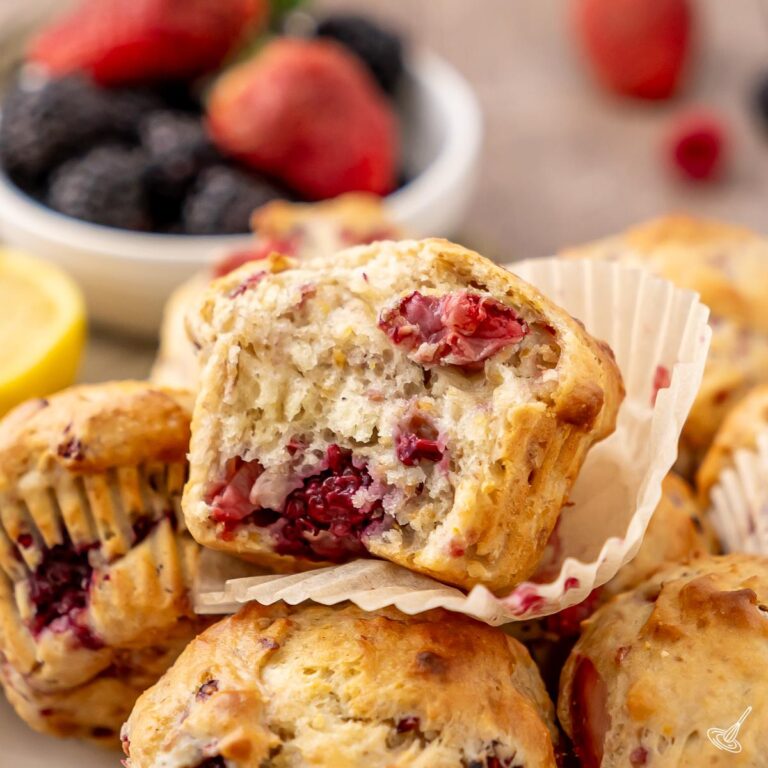 A pile of Mixed Berry Flax Muffins