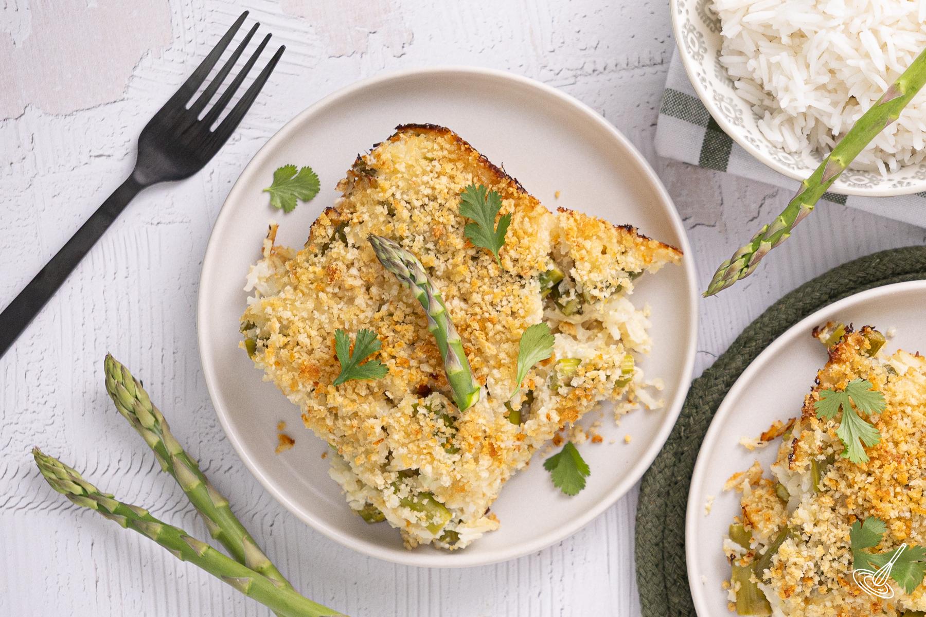 A piece of Asparagus Lemon Rice Casserole on a plate. 