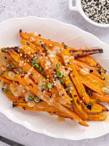 Miso glazed carrots on a platter.