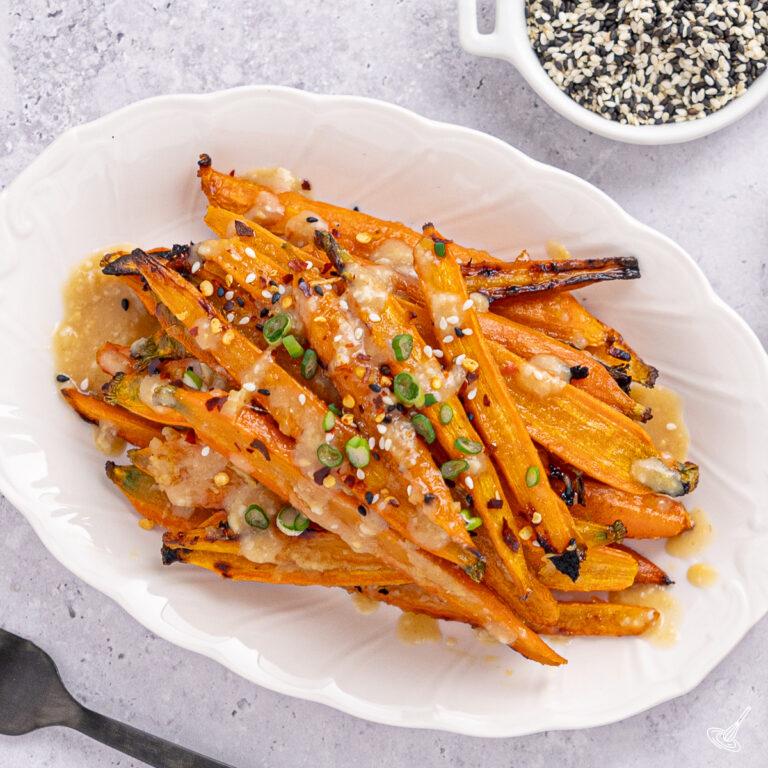 Miso glazed carrots on a platter.