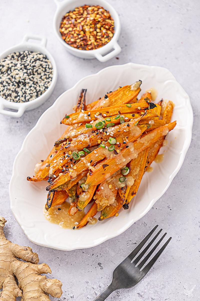 A serving plate of Miso glazed carrots.