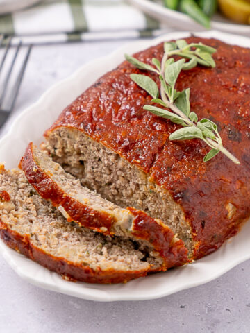 Sliced Turkey Stuffing Meatloaf on plate.