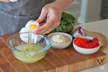 Separate the egg whites and chop all the vegetables.