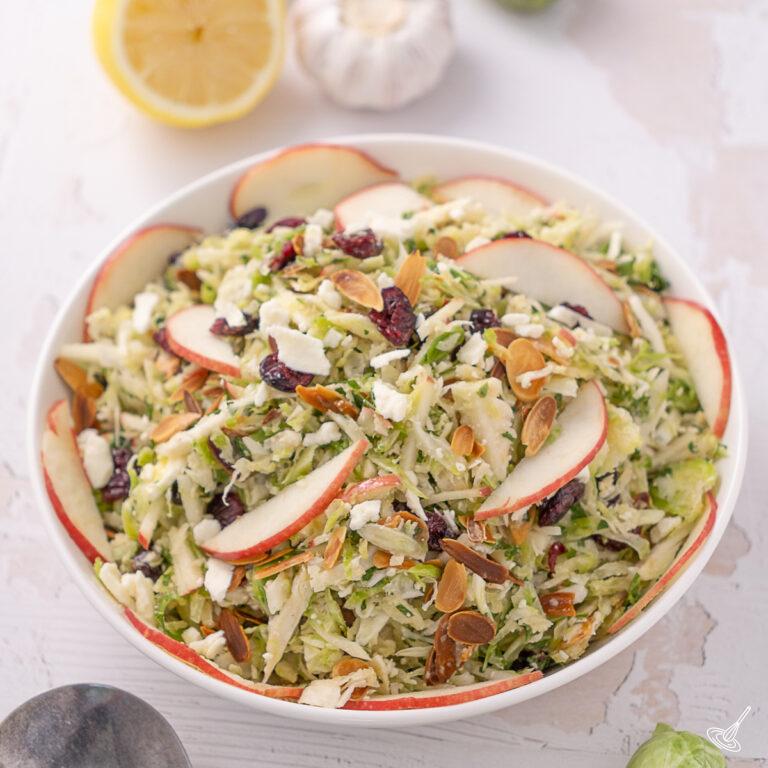 Shaved Brussels Sprout Salad in a serving bowl.