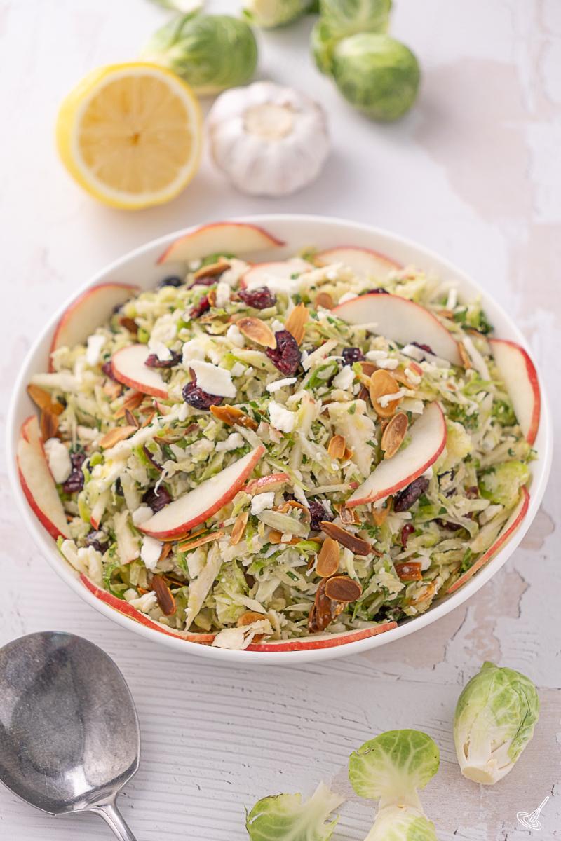 Shaved Brussels Sprout Salad in a serving bowl.