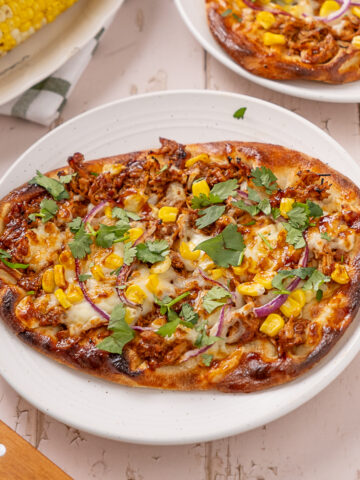 BBQ turkey flatbread on a plate.