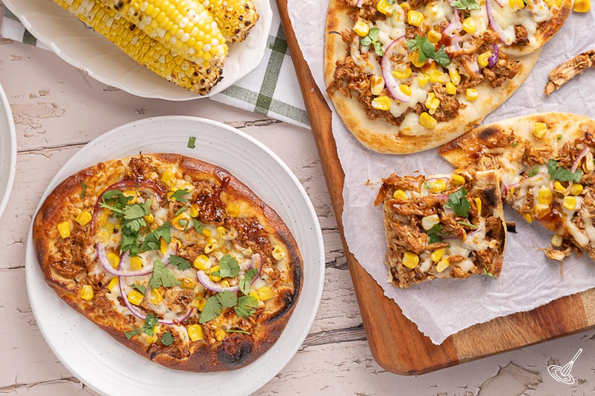 BBQ turkey flatbread on a plate.