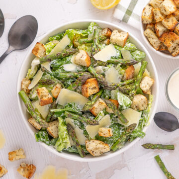 Grilled Asparagus Caesar Salad in a serving bowl.