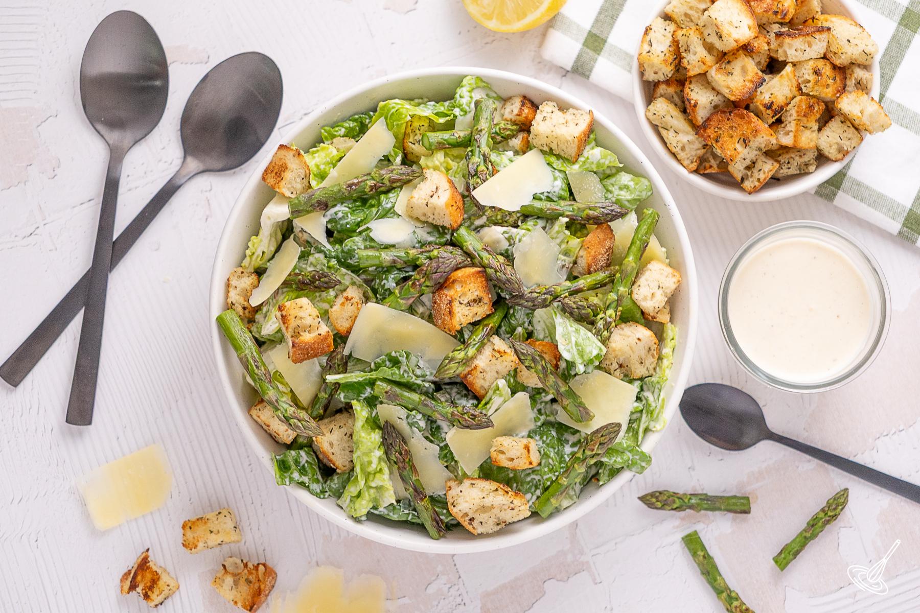 Grilled Asparagus Caesar Salad in a serving bowl.