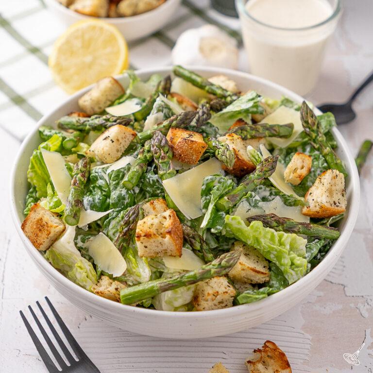 Grilled Asparagus Caesar Salad in a serving bowl.