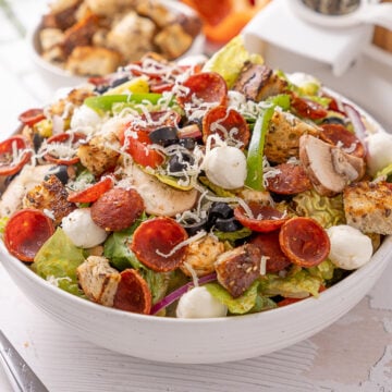Deluze Pizza Salad Recipe in a serving bowl.