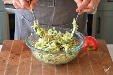 Add the dressing to the salad and toss.