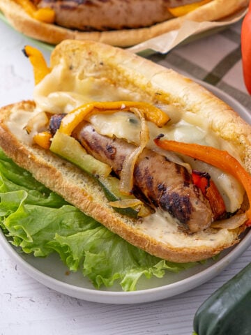 Grilled Italian Turkey Sausage Sandwich on a plate.