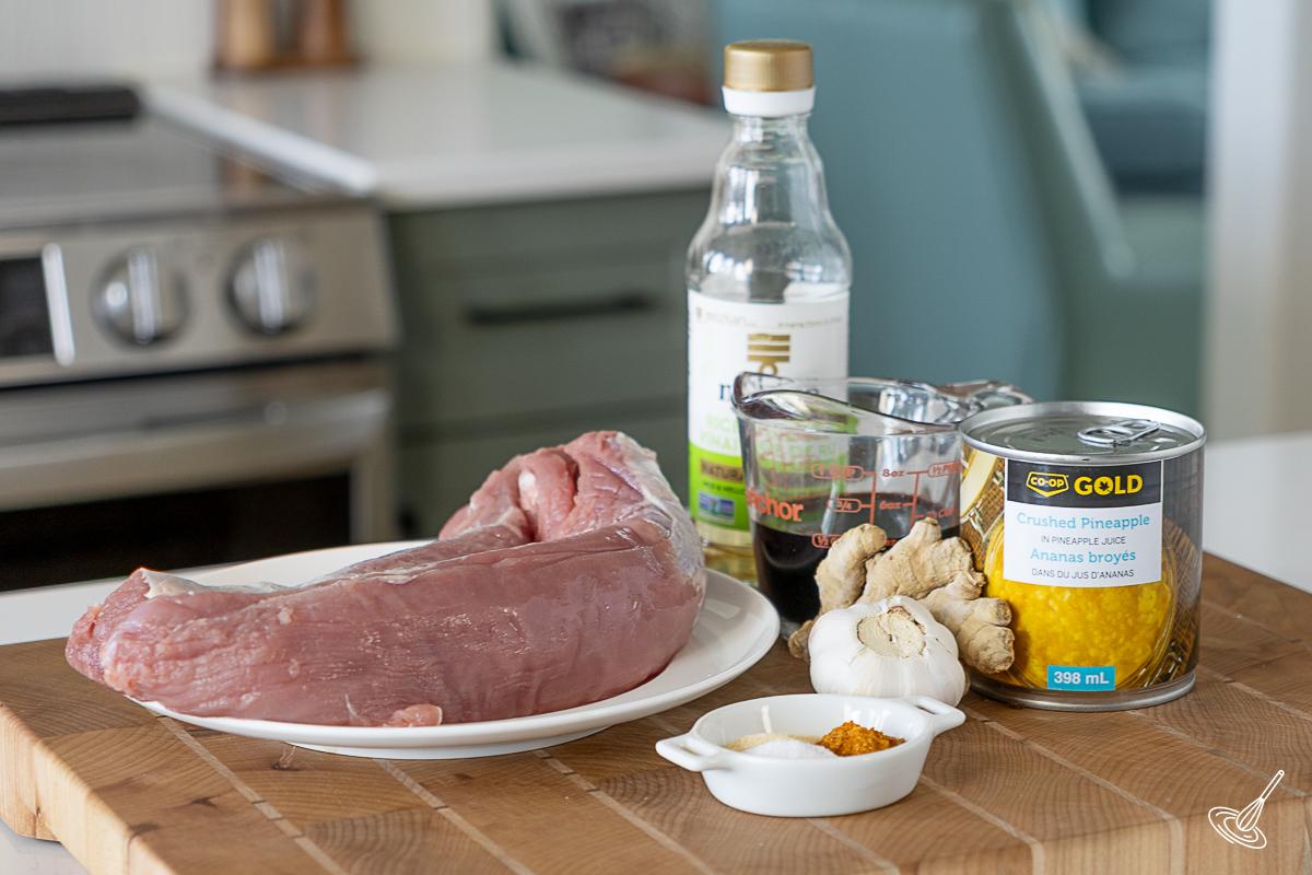 Ingredients to make grilled Pineapple Teriyaki Pork Tenderloin including canned crushed pineapple.