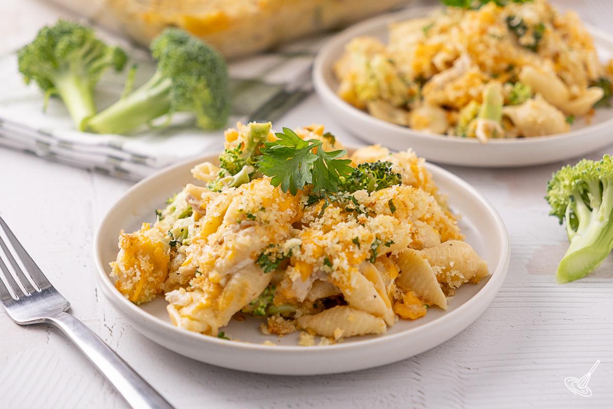 Cheddar Chicken Broccoli Pasta Bake served on plates.