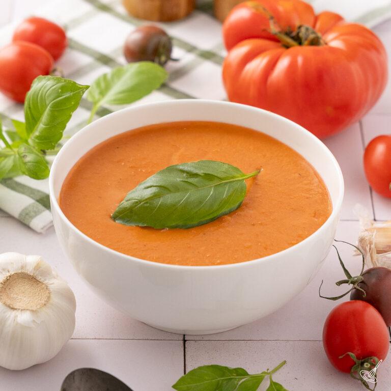 Creamy Roasted Tomato and Garlic Soup in a bowl.